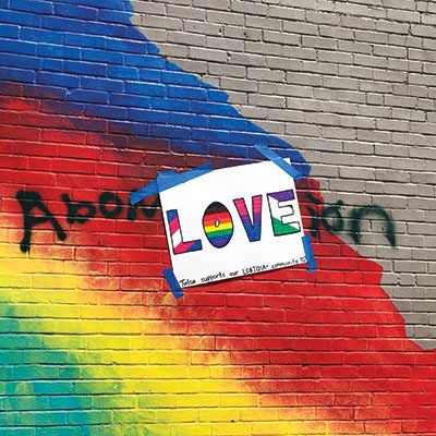 After a vandal defaced the Lynn Riggs Memorial mural, someone covered up the graffiti with a positive message.
