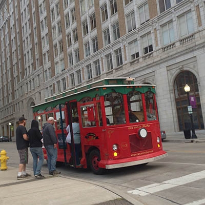 Riders board the Tulsa Downtown Trolley at 4th St. and Boston Ave. // Photo by John Langdon