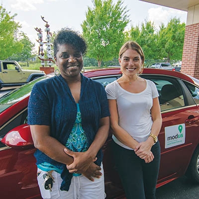 Cledella Evans was the first black female firefighter in Tulsa. Now retired, she volunteers with Modus. At right is Leslie Neal, Modus coordinator.
