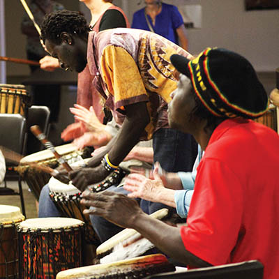 Senegalese musician Sidya Cissokho leads an African drum class at Living Arts