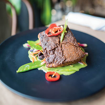 Gingersnap-encrusted salmon with forbidden noodles