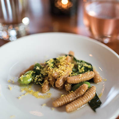 Cavatelli pasta with house-made ricotta cheese, fava beans, and salt-cured duck yolk