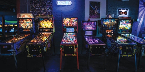 Six of the 10 pinball machines light up The Max. From left: White Water, Family Guy, Deadpool, Total Annihilation, Dr. Who, and The Simpsons.