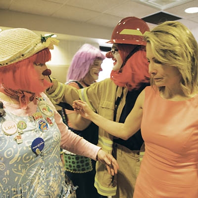 Shannon Miller interacts with therapeutic clowns at St. John Medical Center // Photo by Matt Phipps