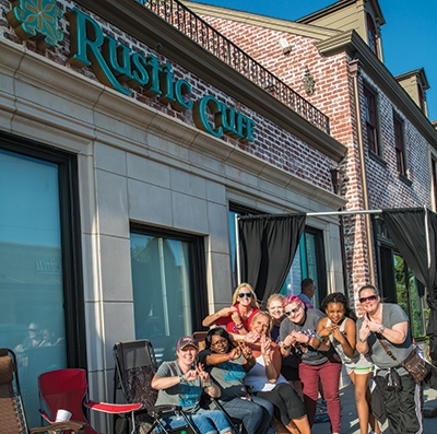 Patrons waiting for the opening of Rustic Cuff’s new storefront on Cherry Street