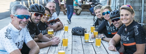 Cyclists on American Solera’s patio after Wednesday Night Ride