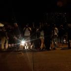 Protesters move to Denver Avenue, blocking traffic for about an hour on Wednesday night.