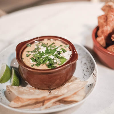 Street corn chowder and creole-spiced pork rinds from The Parish at Hodges Bend