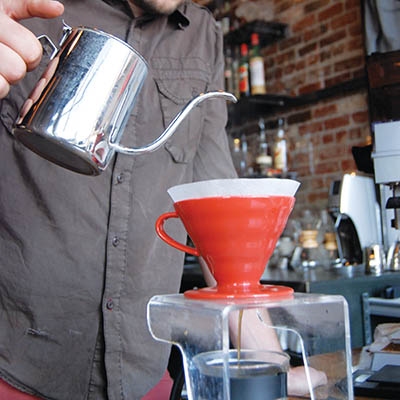 Jack Wood, co-owner of Chimera, demonstrates the pour-over method