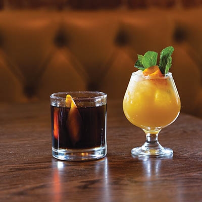 The Cold Fashioned (left) and Winter Juice (right) at Hodges Bend are just two of the zero-proof cocktails you’ll find at Tulsa bars.