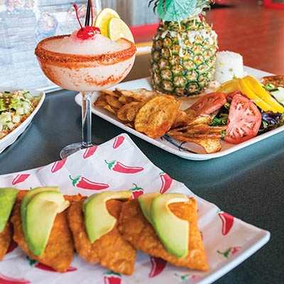 Pina rellena, empanadas de camaron, ceviche pescado, cantarito and a margarita at Fabulosos Mariscos.  