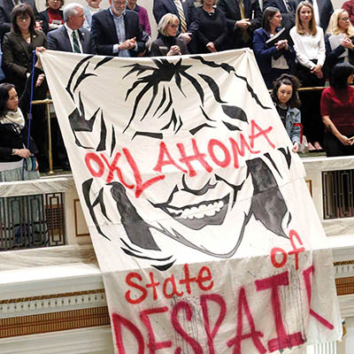 Banner drop in the Capitol Gallery